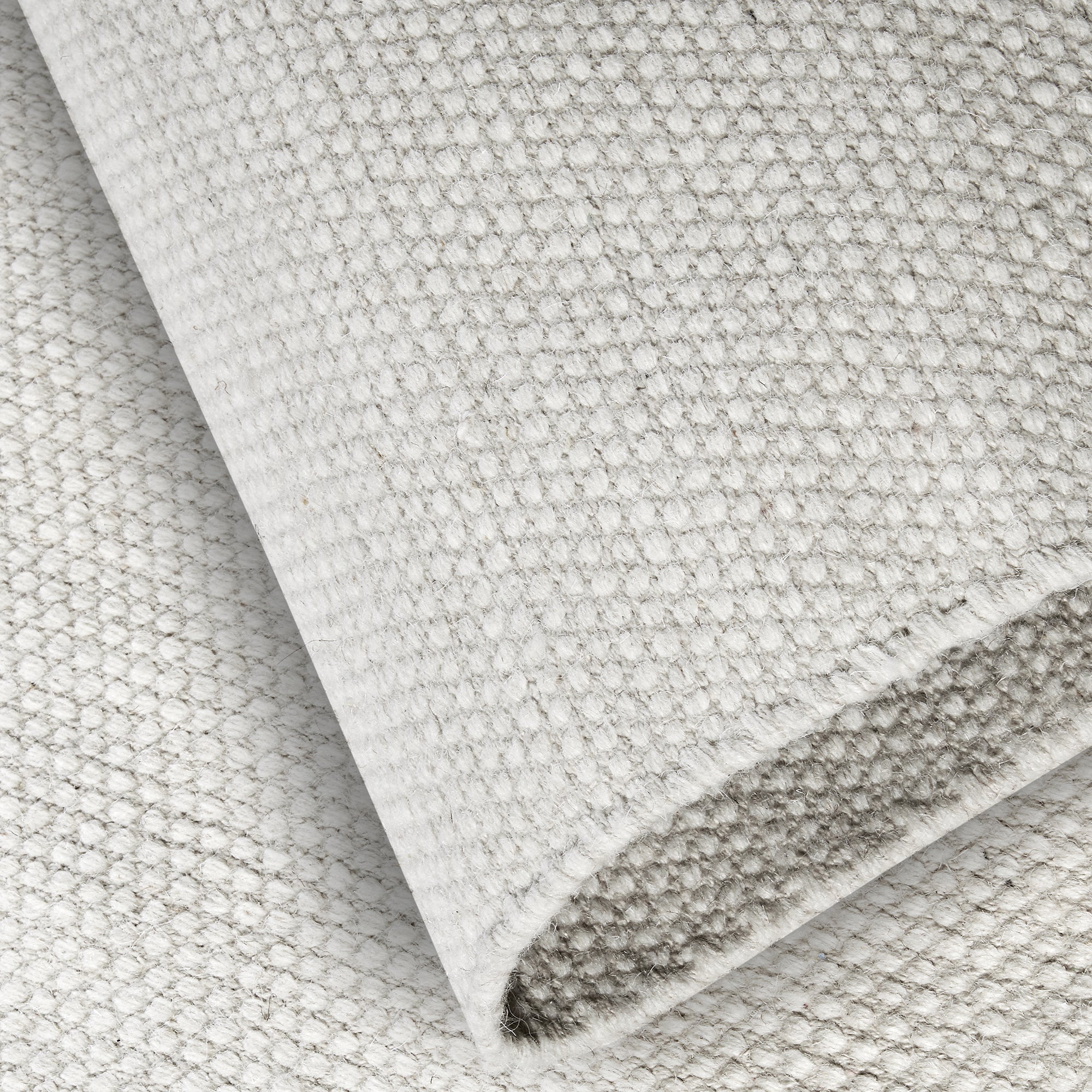 Tapis uni en Laine Blanc Naturel - ELLE Decoration – STUDIO DECO