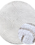 Tapis Rond motifs relief Crème - ELLE Decoration – STUDIO DECO