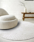 Tapis Rond motifs relief Crème - ELLE Decoration – STUDIO DECO