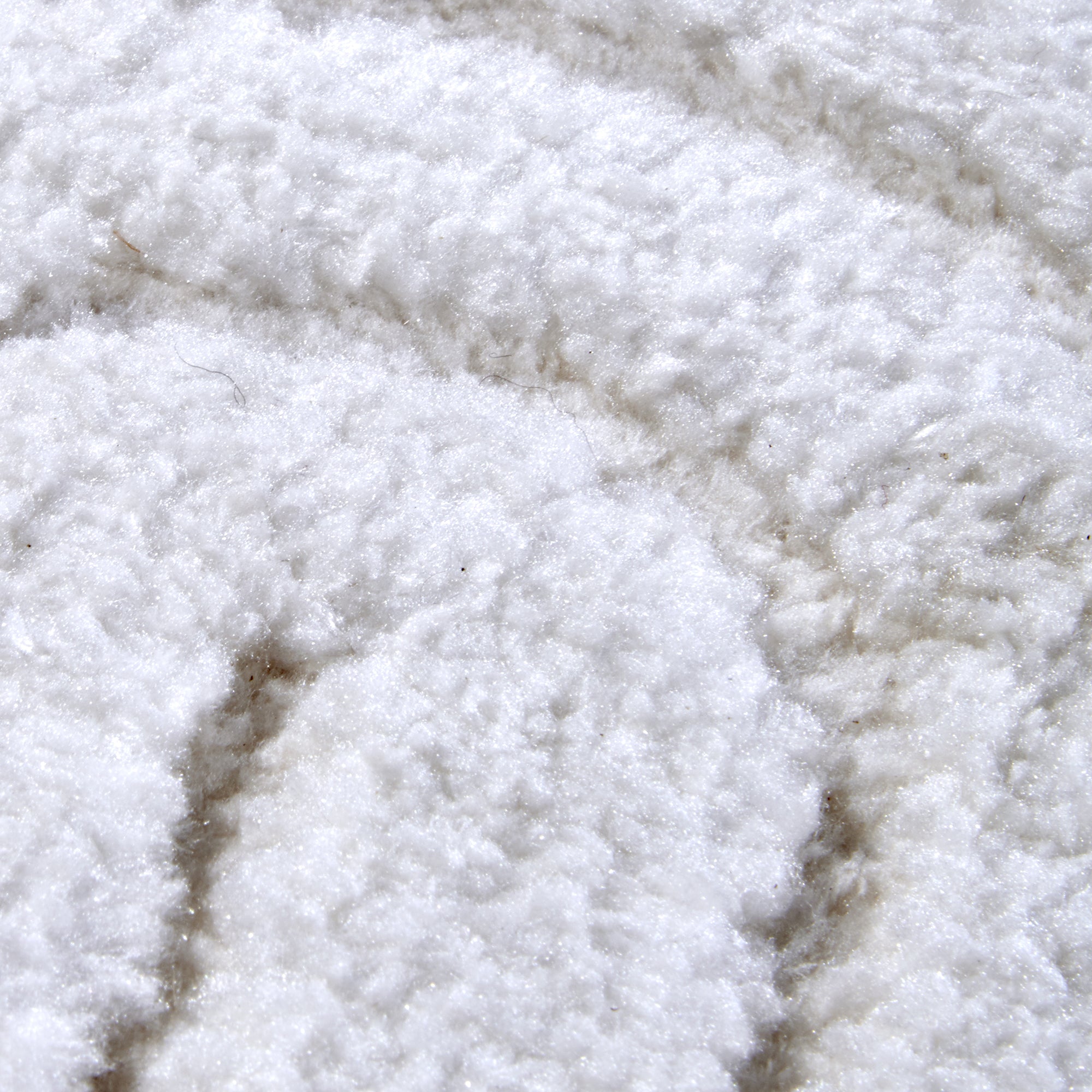 Tapis Rond motifs relief Crème - ELLE Decoration – STUDIO DECO