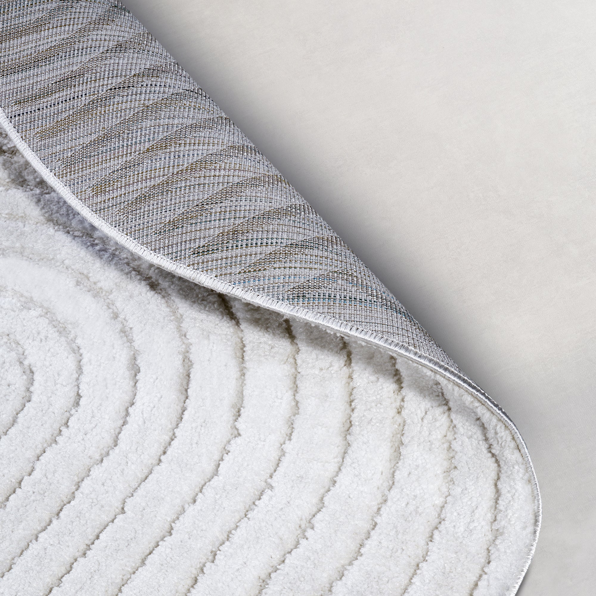 Tapis Rond motifs relief Crème - ELLE Decoration – STUDIO DECO