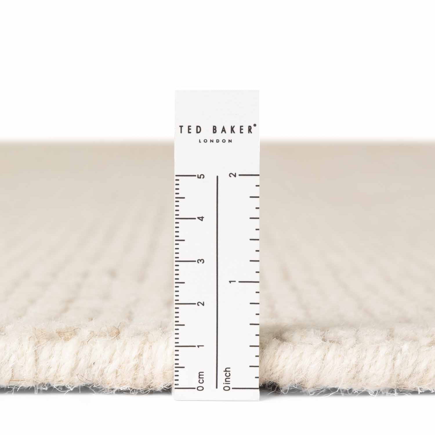 Tapis rond fait main en laine Ivoire - Ted Baker