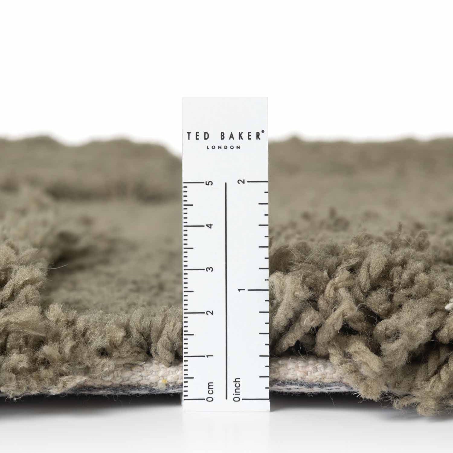 Tapis rond à poils longs en relief Vert - Ted Baker