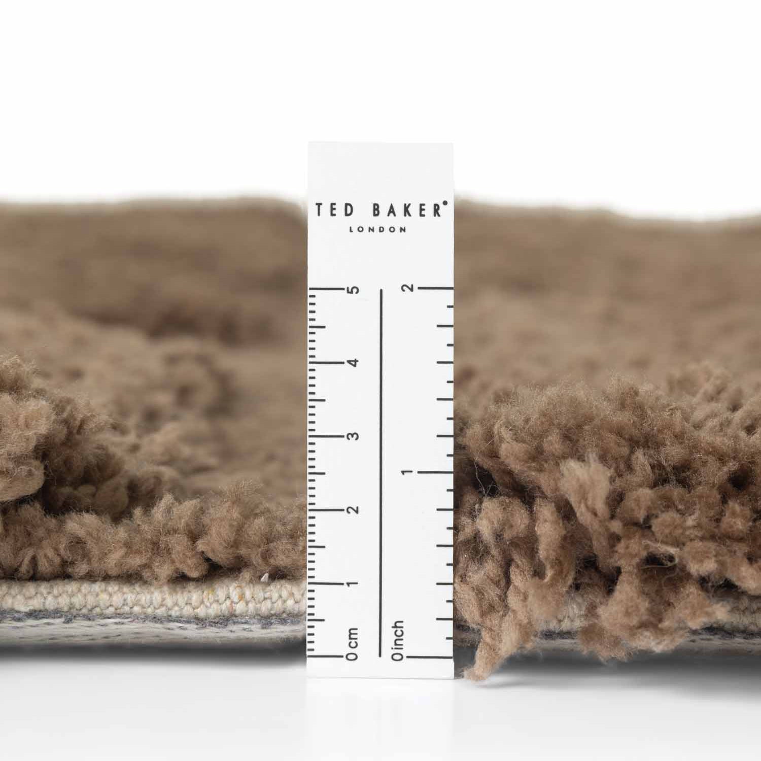 Tapis rond à poils longs en relief Marron - Ted Baker