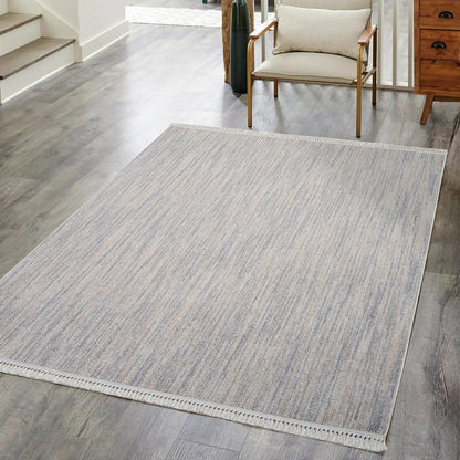 Tapis Nova laineux à franges - Gris