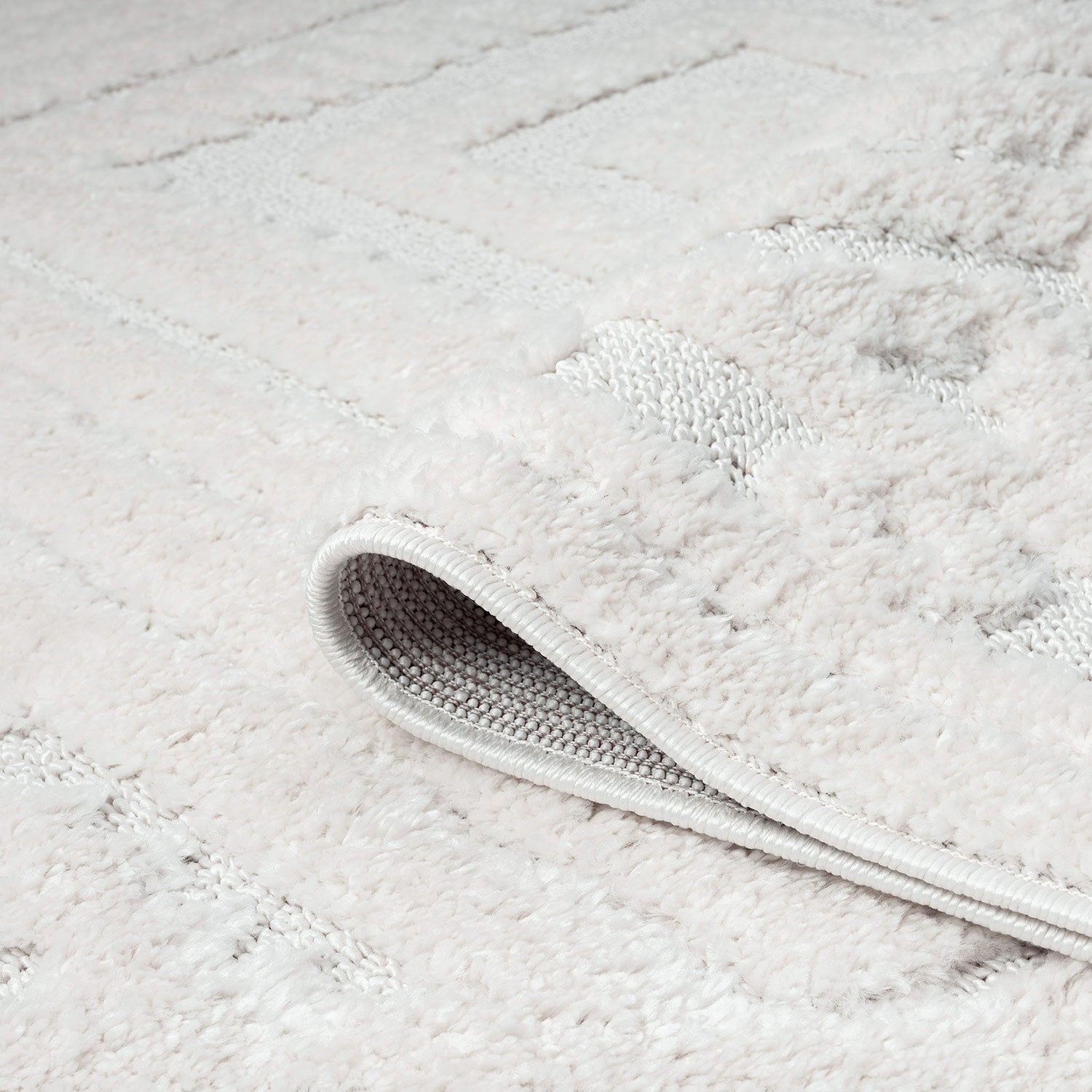 Tapis rond à relief AERA – STUDIO DECO