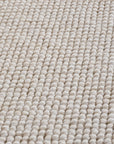 Tapis bouclés à relief Uni Crème – STUDIO DECO