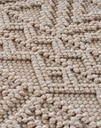 Tapis bouclés à relief ETHNIK Beige – STUDIO DECO