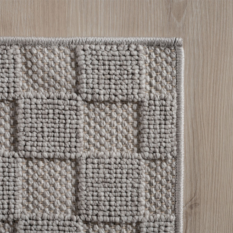 Tapis Rond bouclés à relief DAMIER Gris – STUDIO DECO