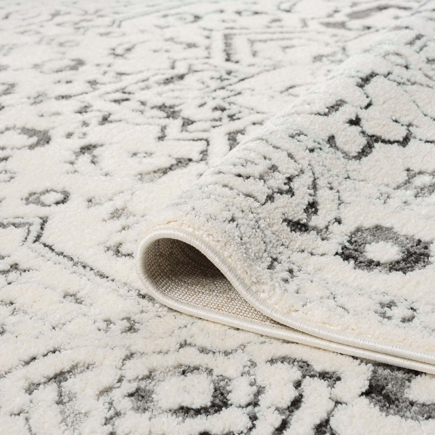 Tapis SORA à motifs vintage en relief - Gris – STUDIO DECO