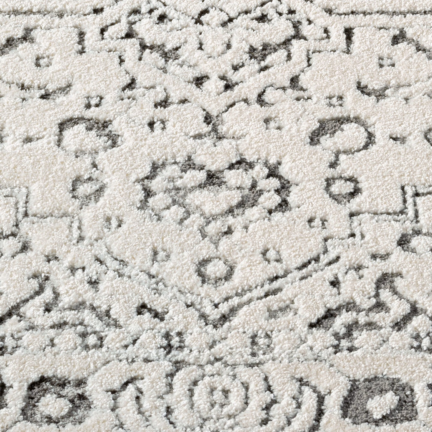 Tapis SORA Rond à motifs vintage en relief - Crème et Gris