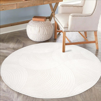 Tapis Rond uni à motifs Arc en relief - Crème