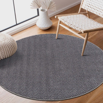 Tapis Rond uni à relief chevrons - Gris