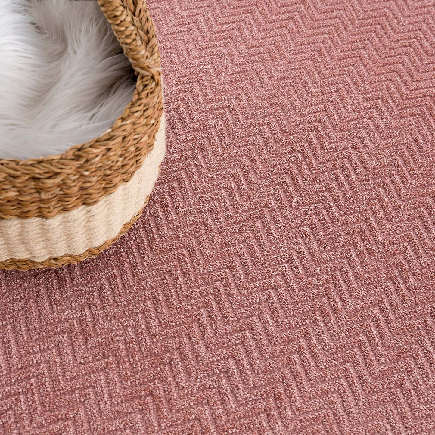 Tapis Rond uni à relief chevrons - Rose