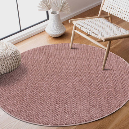 Tapis Rond uni à relief chevrons - Rose