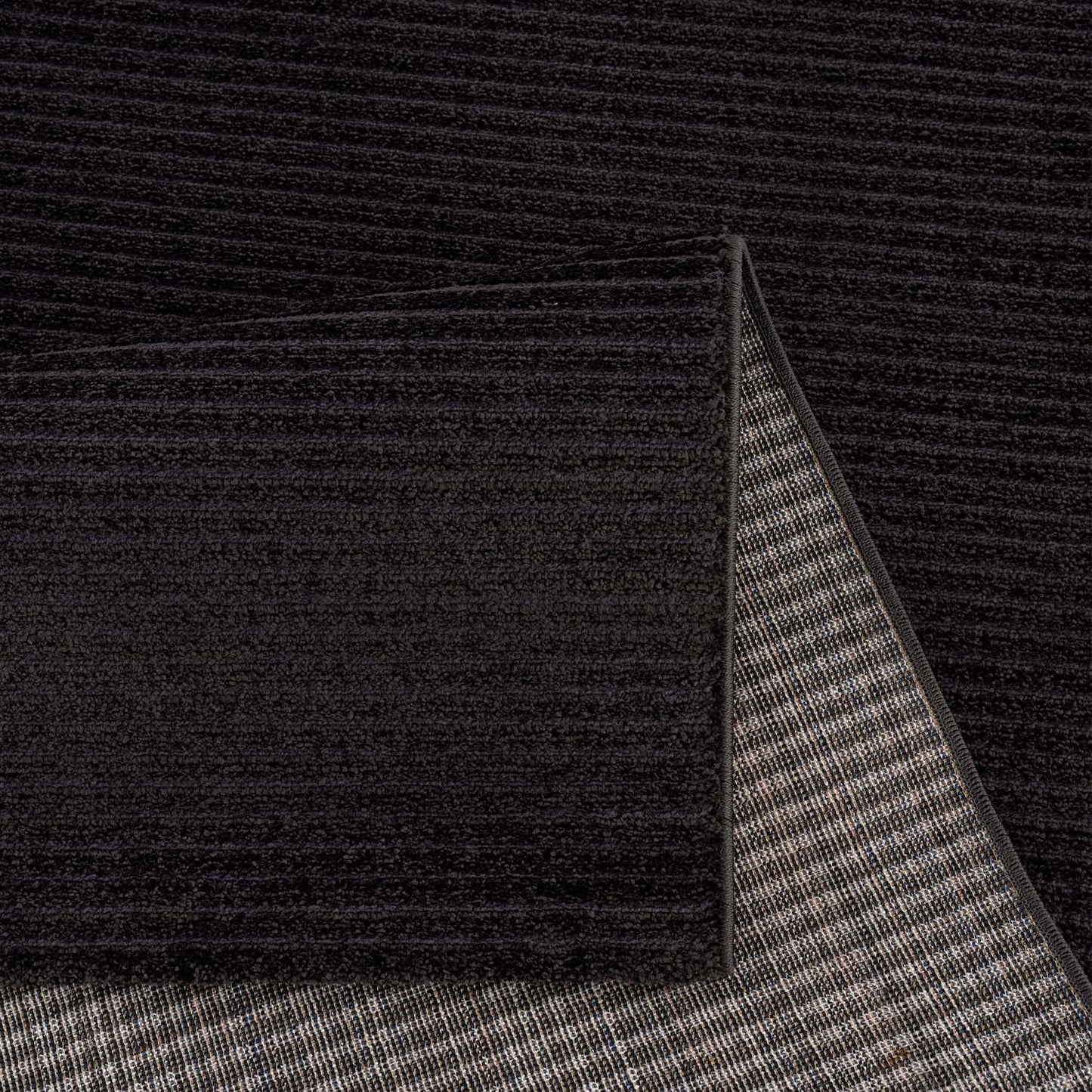 Tapis uni à motifs lignes en relief - Anthracite