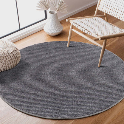 Tapis Rond uni à motifs lignes en relief - Gris