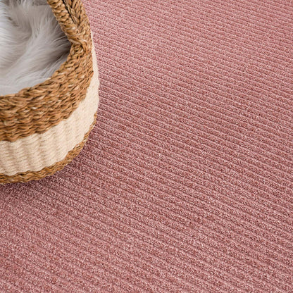 Tapis uni à motifs lignes en relief - Rose