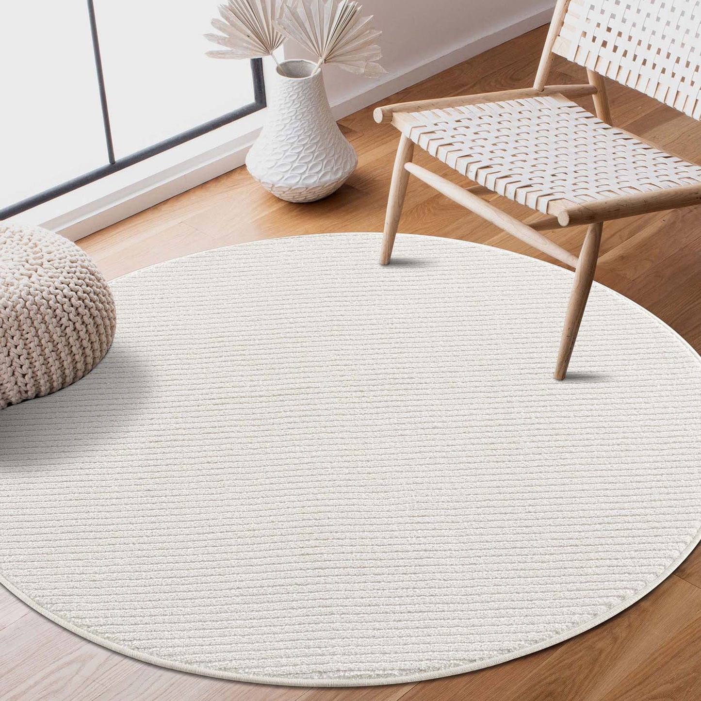 Tapis Rond uni à motifs lignes en relief - Crème