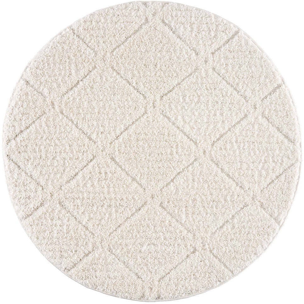 tapis rond crème à poils longs et motifs relief