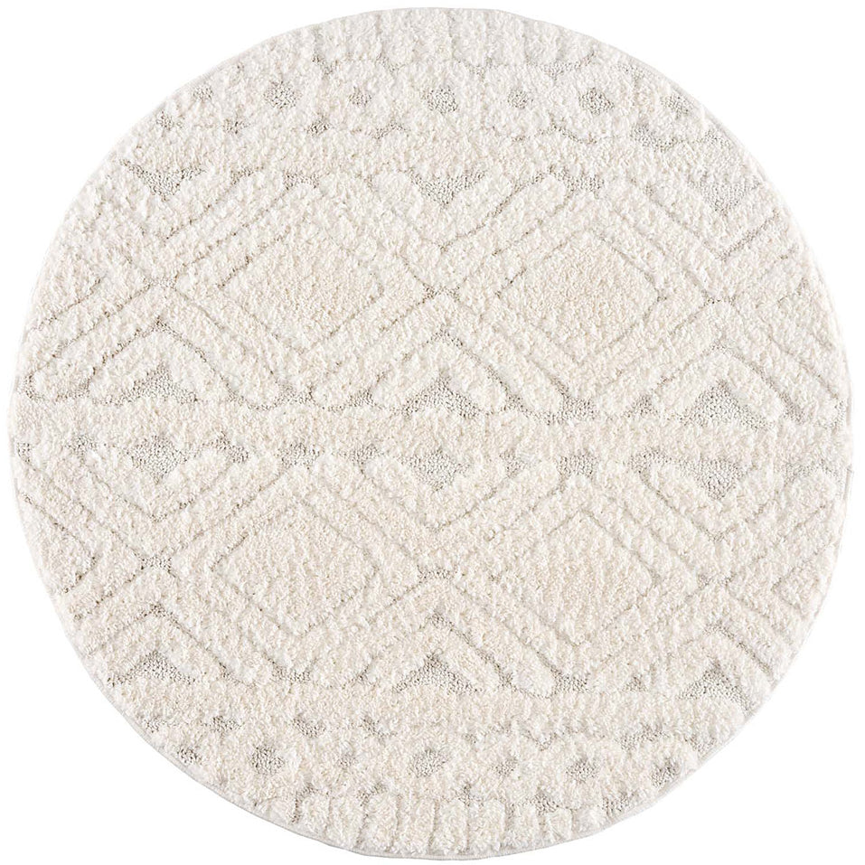 tapis rond crème à poils longs et motifs relief